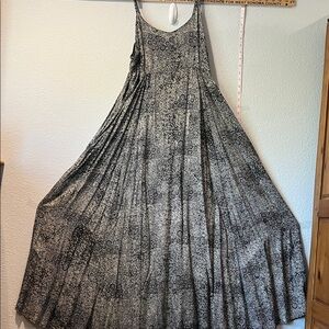 Beautiful batik maxi dress with adjustable straps. Roomy pockets.